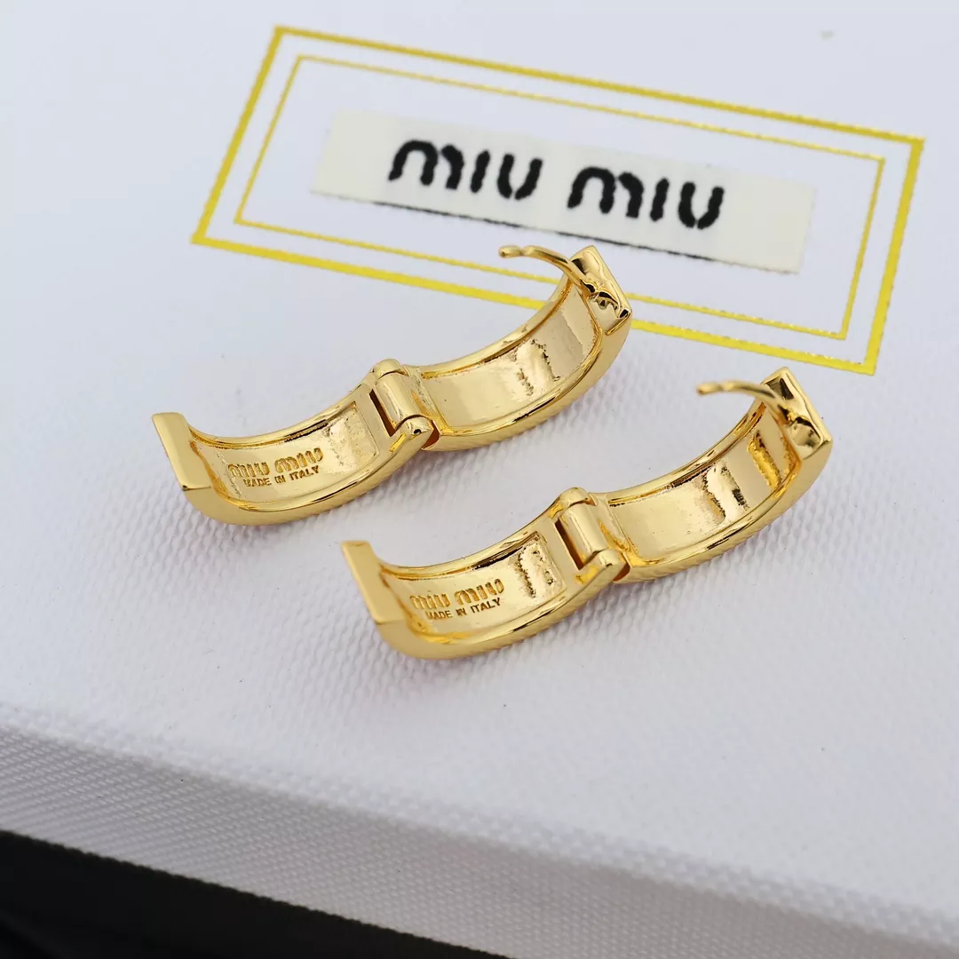 miu miu boucles doreilles pour femme s_12b03003